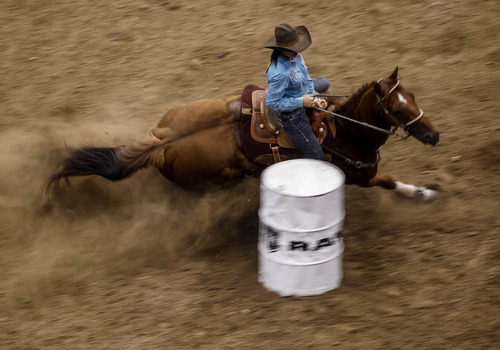 Trent Nelson  |  The Salt Lake Tribune
Tasha Welsh competing in Barrel Racing at the Days of '47 Rodeo at EnergySolutions Arena in Salt Lake City Saturday July 20, 2013.