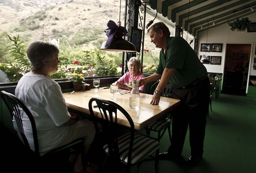 Leah Hogsten  |  The Salt Lake Tribune
Peery King, owner of The Greenery restaurant, delivers a Mormon Muffin to Lois Stuart and her mother, Marge Fisher, who split a muffin every month during a lunch outing. The Greenery restaurant in Ogden serves up between 300 and 500 of the bran muffins daily.