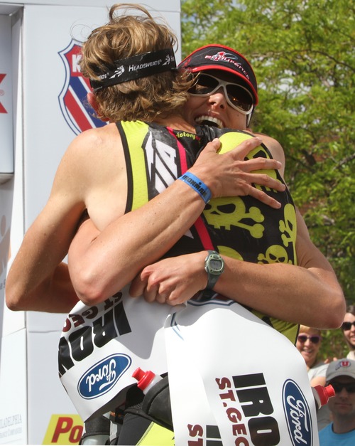 Rick Egan   |  The Salt Lake Tribune

Trevor Wurtele hugs his wife, Heather Wurtele at the finishline in the St. George Ironman competition, Saturday, May 1, 2010.  Heather Wurtele was the frirst place woman finisher, Trevor Wurtele finished the race minutes before his wife.