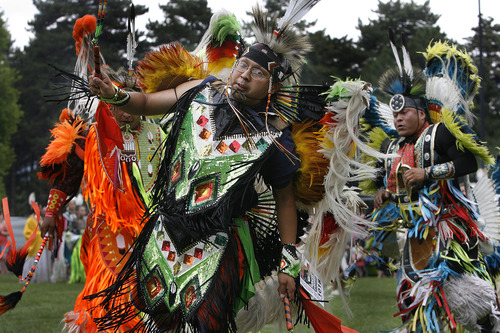 Scott Sommerdorf   |  The Salt Lake Tribune
The opening procession and grand entry of dancers into the ring at the Native American celebration in the Park - the annual Pioneer Day event celebrating American Indian culture, Wednesday, July 24, 2013.