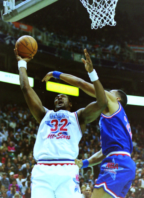 Steve Griffin  |  The Salt Lake Tribune
Jazz forward Karl Malone gets off a shot against the defense of Larry Nance during the 1993 NBA All-Star Game at the Delta Center in Salt Lake City.
