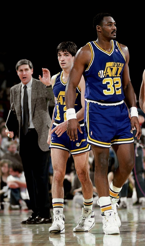 Tribune file photo

Karl Malone, right, and John Stockton played most of their Jazz career with Jerry Sloan, left, as their coach.