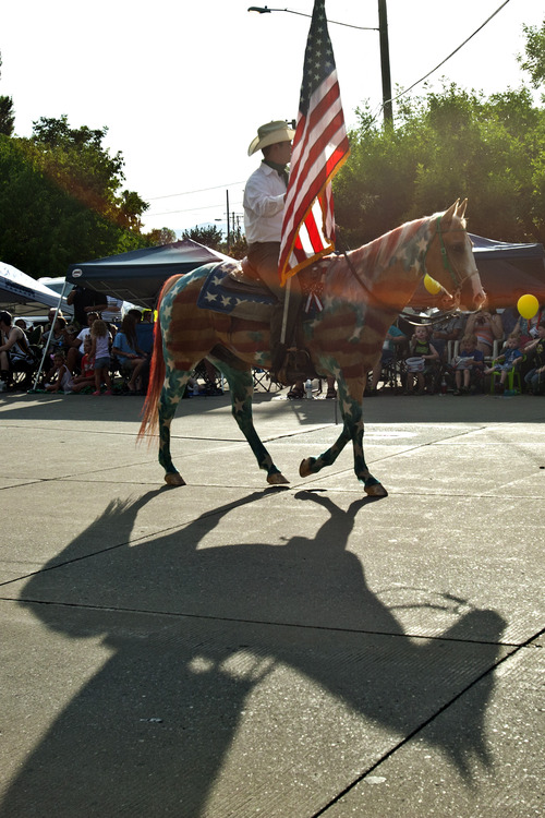 Chris Detrick  |  The Salt Lake Tribune
A horse painted like the American Flag during the 62nd annual Bountiful Handcart Days Grand Parade Tuesday July 23, 2013.