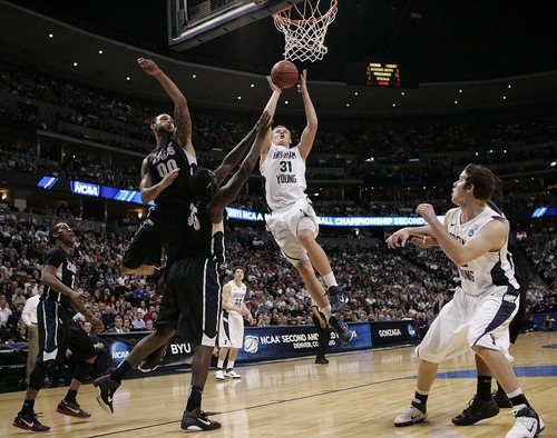 Trent Nelson  |  The Salt Lake Tribune
BYU's Kyle Collinsworth scores as BYU defeats Gonzaga in the NCAA Tournament, men's college basketball at the Pepsi Center in Denver, Colorado, Saturday, March 19, 2011, earning a trip to the Sweet 16.