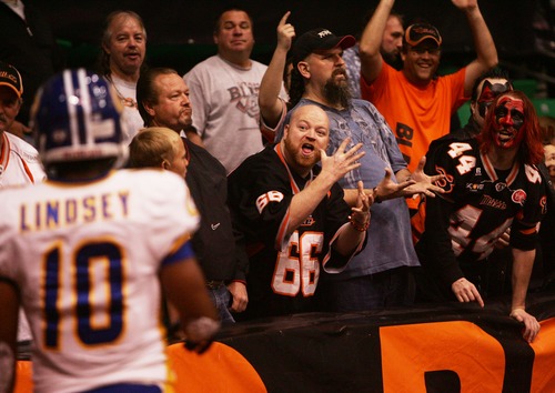 Kim Raff  |  The Salt Lake Tribune
Blaze fans taunt Storm player Michael Lindsey before a kick off during the first quarter of a game at EnergySolutions Arena in Salt Lake City on April 6, 2013.