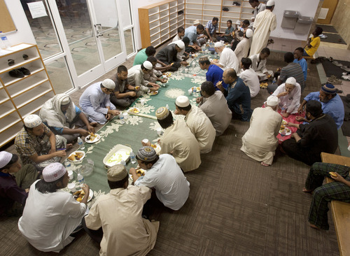 Steve Griffin | The Salt Lake Tribune

Muslims gather outside the prayer hall at the Khadeeja Islamic Center to break the Ramadan Fast in West Valley City Sunday July 21, 2013.