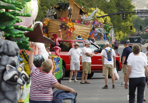 Al Hartmann  |  The Salt Lake Tribune
Parade spectators and participants get an early start for the July 24 parade festivities at 7:30 a.m.