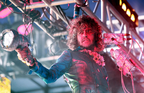 Michael Brandy  |  Special to The Tribune
Lead singer Wayne Coyne and the Flaming Lips perform for a large crowd during the Twilight Series at Pioneer Park in Salt Lake City.