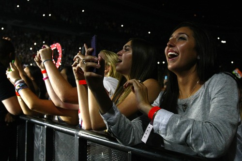 Chris Detrick  |  The Salt Lake Tribune
Fans cheer for One Direction- Niall Horan, Zayn Malik, Liam Payne, Harry Styles and Louis Tomlinson- as they perform at Maverik Center Thursday July 25, 2013.