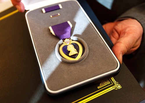 Trent Nelson  |  The Salt Lake Tribune
The Purple Heart awarded posthumously to World War I veteran Walter H. Anderson in Salt Lake City, Friday July 26, 2013.