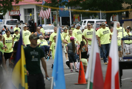 Scott Sommerdorf   |  The Salt Lake Tribune
United Mine Workers march in the International Days Parade in Price, Saturday, July 27, 2013.
