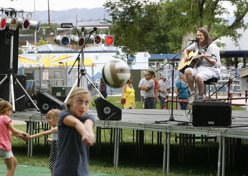Scott Sommerdorf   |  The Salt Lake Tribune
Pioneer Park in Price hosted carnival games and music for International Days in Price, Saturday, July 27, 2013.