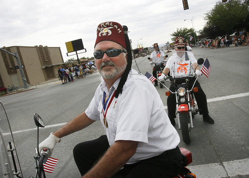 Scott Sommerdorf  |  The Salt Lake Tribune
Shriners on motorbikes entertain at the International Days Parade in Price on Saturday.