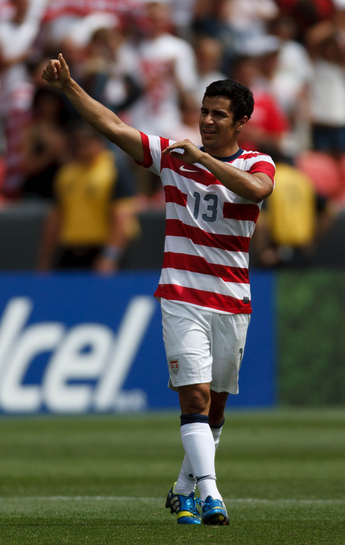 Trent Nelson  |  The Salt Lake Tribune
USA's Tony Beltran acknowledges the crowd as the United States faces Cuba in CONCACAF Gold Cup soccer at Rio Tinto Stadium in Sandy, Saturday July 13, 2013.