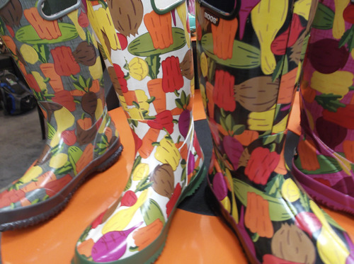 Sean P. Means  |  The Salt Lake Tribune
Yes, gardening does qualify as an outdoor activity -- as testified by the design on these galoshes by Bogs Footwear, on display at the Outdoor Retailers Summer Market at the Salt Palace.