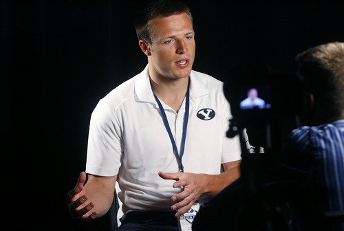 Scott Sommerdorf   |  The Salt Lake Tribune
BYU QB Taysom Hill is interviewed in the tv studios during the school's annual football media day on Wednesday at the BYU Broadcasting building, Wednesday, June 26, 2013.