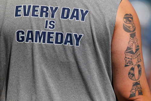 Trent Nelson  |  The Salt Lake Tribune
Every Day is Gameday, reads a shirt on a coach at BYU football practice in Provo Saturday August 3, 2013.