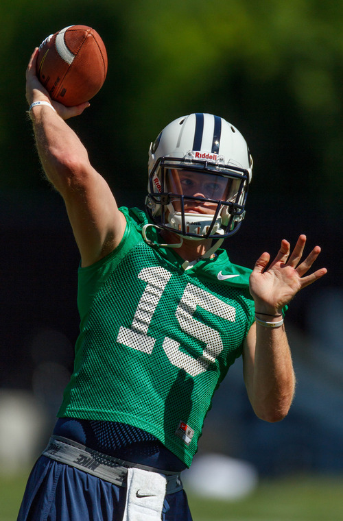 Trent Nelson  |  The Salt Lake Tribune
Ammon Olsen warming up at BYU football practice in Provo Saturday August 3, 2013.