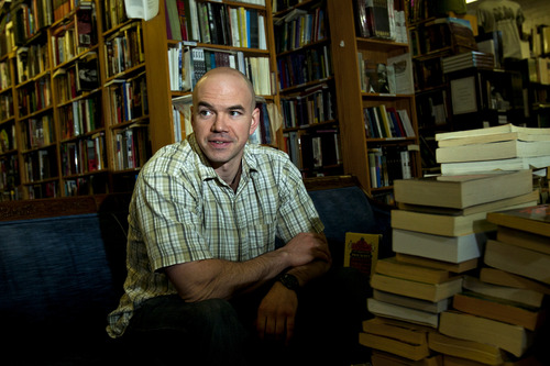 Chris Detrick  |  The Salt Lake Tribune
Tim DeChristopher works at Ken Sanders Rare Books Tuesday April 23, 2013. DeChristopher was released just Sunday from his 21-month term for fraudulently bidding on public land leases at a 2008 Bureau of Land Management oil and gas auction. He had hoped to prevent drilling on sensitive land.