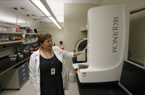 Francisco Kjolseth  |  The Salt Lake Tribune
Mary Bronner, division chief of anatomic pathology at the Huntsman Cancer Institute, describes the inner workings of the Sequenom instrument, which in part can detect gene mutations for cancers.