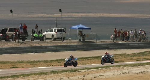 Leah Hogsten  |  The Salt Lake Tribune
Roger Hayden (#54) of Owensboro, Ky., was in the lead during the AMA Pro National Guard Superbike event until his bike malfunctioned in the remaining two laps and put him in second at the AMA Pro Road Racing event at Miller Motorsports Park, August 4, 2013.