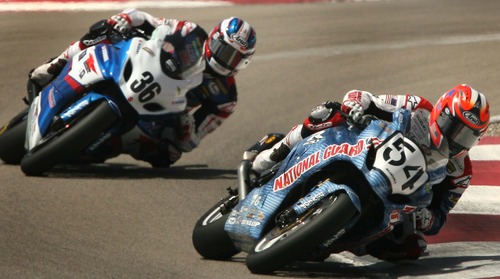 Leah Hogsten  |  The Salt Lake Tribune
Roger Hayden (#54) of Owensboro, Ky., was in the lead during the AMA Pro National Guard Superbike event until his bike malfunctioned in the remaining two laps. Martin Cardenas of Medellin, Colombia (#36), who was hot on Hayden's back tire, took the lead to win at the AMA Pro Road Racing event at Miller Motorsports Park, August 4, 2013.