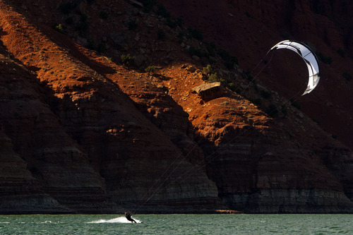 Chris Detrick  |  The Salt Lake Tribune
A man kite surfs on Flaming Gorge Saturday August 3, 2013.