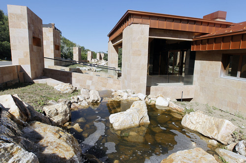 Al Hartmann  |  The Salt Lake Tribune
Water features in front of a home for sale at 3809 Thousand Oaks Circle in Salt Lake City.