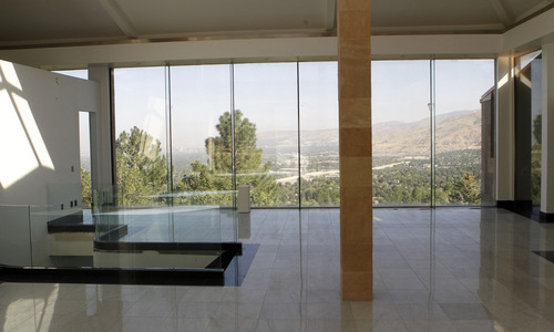 Al Hartmann  |  The Salt Lake Tribune
Large picture windows have a view of the Salt Lake Valley from the main floor of a home for sale at 3809 Thousand Oaks Circle in  Salt Lake City.