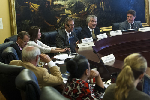 Chris Detrick  |  The Salt Lake Tribune
Members of a special House committee investigating Attorney General John Swallow listen as Eric N. Weeks, deputy general counsel, speaks at the Utah State Capitol Tuesday August 6, 2013.
