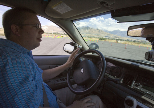 Keith Johnson | The Salt Lake Tribune

Nate Davis maneuvers a vehicle through an obstacle course at the Department of Public Safety Emergency Vehicle Operations driving range in Lehi on Wednesday, Aug. 7, 2013. Nate and two other drivers deprived themselves of sleep for 30 hours before demonstrating the potential effects of drowsy driving. It was coordinated by Sleep Smart. Drive Smart., an alliance of organizations dedicated to educating the public about the potentially fatal consequences of driving tired.