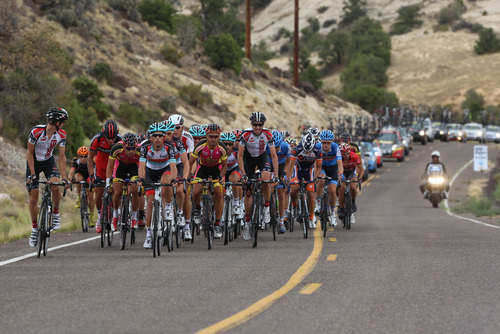 Francisco Kjolseth  |  The Salt Lake Tribune
The peloton climbs onto the Hogsback from Calf Creek along Highway 12 as the Tour of Utah covers some of Utah's most scenic areas for stage 2 with riders taking on 130 miles from Panguitch to Torrey on Wednesday, Aug. 7, 2013.