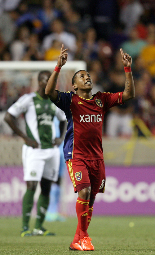 Steve Griffin | The Salt Lake Tribune

Real Salt Lake's Joao Plata points to the sky in celebration after scoring, what turned out to be the game winning goal, during second half action of the RSL vs. Portland U.S. Open Cup semifinals soccer match at Rio Tinto Stadium in Sandy, Utah Wednesday August 7, 2013.