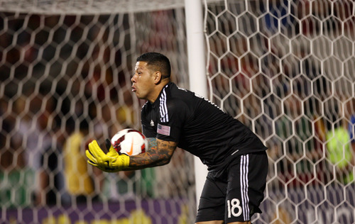 Steve Griffin | The Salt Lake Tribune

Real Salt Lake's Nick Rimando scoops up a shot during second half action of the RSL vs. Portland U.S. Open Cup semifinals soccer match at Rio Tinto Stadium in Sandy, Utah Wednesday August 7, 2013.