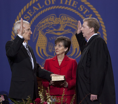 Steve Griffin | The Salt Lake Tribune


JoLynn Bell holds the Bible for her husband, Utah Lt. Gov. Greg Bell,  as he is sworn in by Chief Justice Matthew B. Durrant at the Utah State Capitol  in Salt Lake City, Utah Monday January 7, 2013.