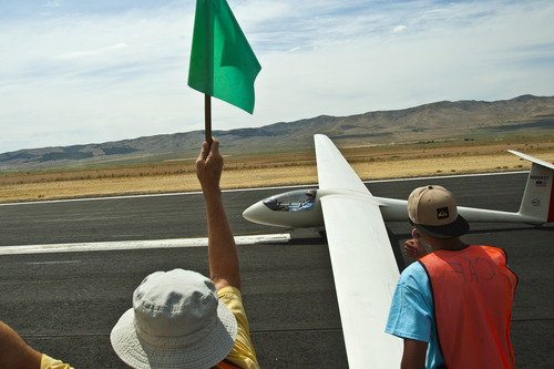 Chris Detrick  |  The Salt Lake Tribune
Mike Kennedy, of Venice, Calif., gets ready to take off in his glider during the Nephi Glider Competition at the Nephi Airport Wednesday August 7, 2013. About 40 pilots from around the country participated in the weeklong event.