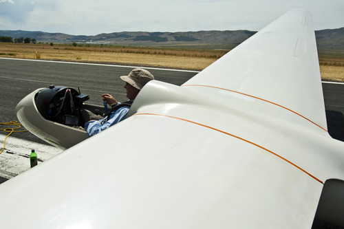 Chris Detrick  |  The Salt Lake Tribune
Mike Kennedy, of Venice, Calif., gets ready to take off in his glider during the Nephi Glider Competition at the Nephi Airport Wednesday Aug. 7, 2013. About 40 pilots from around the country participated in the weeklong event.