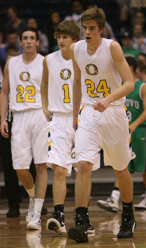 Leah Hogsten  |  The Salt Lake Tribune
Cole Payne, second from left, plays for Orem High against Provo High School in January 2012, in Orem. (Josh Pollard is at left, Christian Clark at right.) Payne has made headlines with a recent video of him playing street ball on his LDS mission.