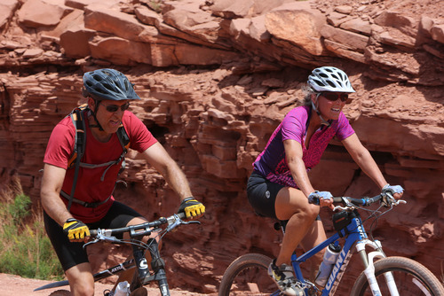 Francisco Kjolseth  |  The Salt Lake Tribune
Mountain bikers Andy and Marcia Walker of Sandy at the end of their 75-mile ride on the White Rim Trail in Canyonlands National Park in May 2013.