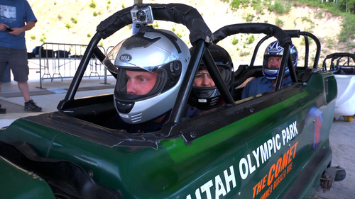 Salt Lake Tribune writer Brett Prettyman, back of the bobsled, preapres for his summer bobsled ride at Utah Olympic Park in June 2012. The aerial ski lessons and bobsled rides are part of The Utah Bucket List show airing on KUED-Channel 7 in August. Courtesy KUED