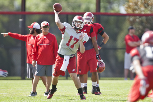 Chris Detrick  |  The Salt Lake Tribune
Utah's Conner Manning (17) looks to throw the ball during a practice at the University of Utah Wednesday August 7, 2013.