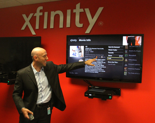 Rick Egan  | The Salt Lake Tribune 

Matthew Strauss, senior vice president of video services for Comcast, recently demonstrates the company's newest cable television platform called X1.