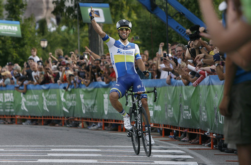 Michael Matthews, of Australia, celebrates his win in Stage 4 of the Tour of Utah cycling race, Friday, Aug. 9, 2013, in Salt Lake City. (AP Photo/The Salt Lake Tribune, Scott Sommerdorf) DESERET NEWS OUT  LOCAL TV OUT  MAGS OUT