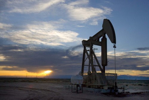 An oil pump stands out against the  evening sky in the oil fields of the Uinta Basin on  Thursday, May 28,2009  photo:Paul Fraughton/ The Salt Lake Tribune