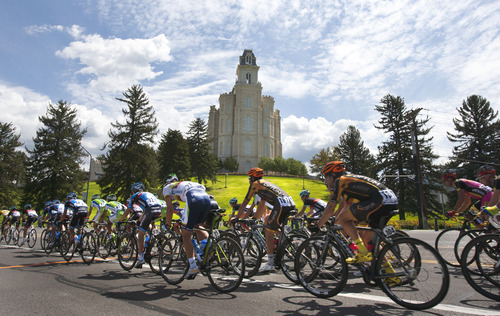 Steve Griffin | The Salt Lake Tribune

Bicycle racers zip by the Manti Temple as they make their way from Richfield to Payson during the 2013 Tour of Utah bike race in Manti, Utah, Thursday, Aug. 8, 2013.