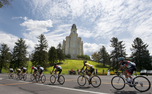 Steve Griffin | The Salt Lake Tribune

Bicycle racers zip by the Manti Temple as they make their way from Richfield to Payson during the 2013 Tour of Utah bike race in Manti, Utah, Thursday, Aug. 8, 2013.