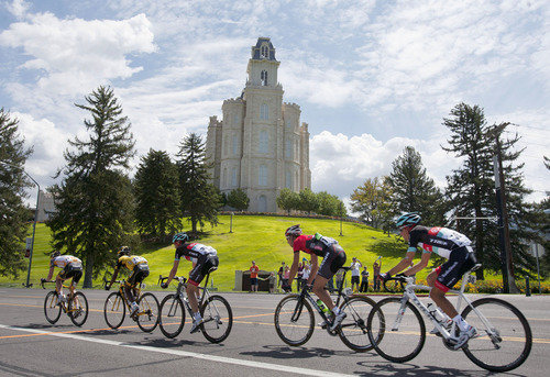 Steve Griffin | The Salt Lake Tribune

Bicycle racers zip by the Manti Temple as they make their way from Richfield to Payson during the 2013 Tour of Utah bike race in Manti, Utah, Thursday Aug. 8, 2013.