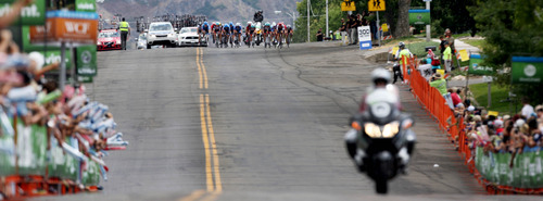 Steve Griffin | The Salt Lake Tribune

The chase group is left to fight it out for second as they approach the finish line in the third stage of the 2013 Tour of Utah bike race in Payson, Utah Thursday August 8, 2013. After breaking away from the field, Lachlan Morton, of Team Garmin Sharp, won the race.