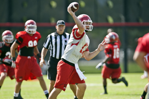 Chris Detrick  |  The Salt Lake Tribune
Utah's Conner Manning (17) looks to throw the ball during a practice at the University of Utah, Wednesday, Aug. 7, 2013.