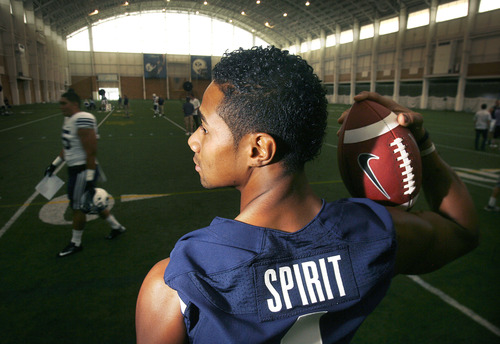 Scott Sommerdorf   |  The Salt Lake Tribune
BYU WR Ross Apo, shows the SPIRIT on the back of his jersey that will replace his name this year, Thursday, August 8, 2013. Other players will wear HONOR, and TRADITION.